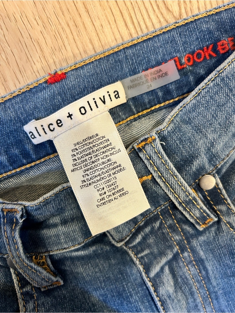 Alice + Olivia Denim Flare Jeans with Multicolor Paisley Embroidery - Picture 8 of 16